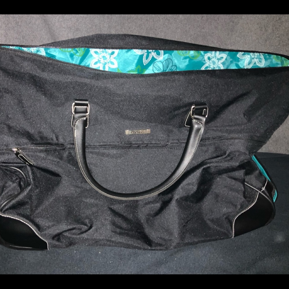 Brand new black travel roller bag